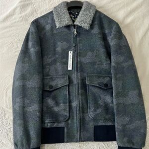 Wool bomber jacket. It’s a large but fits like a medium